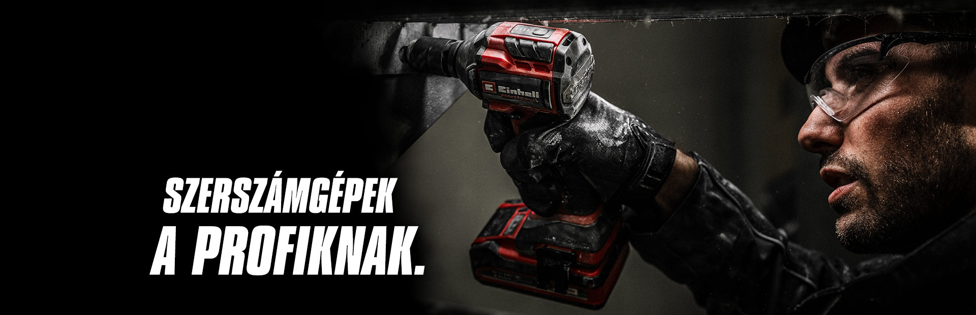 A hand holds a red cordless impact wrench being used on a metal beam, with the text "Power Tools for Pros".