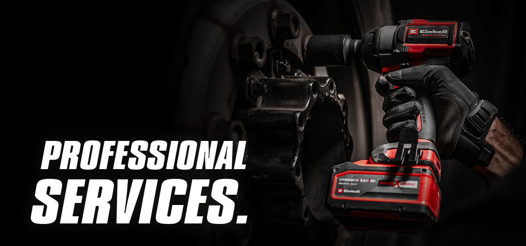 Close-up of a red cordless impact wrench being used on a wheel, with the text "Professional Services".